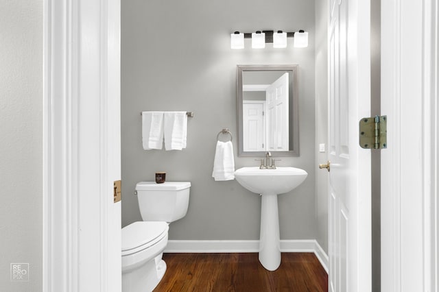 100 Homestead Dr, Wood Dale, IL 60191 - bathroom featuring toilet and wood finished floors