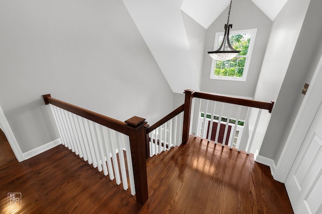 100 Homestead Dr, Wood Dale, IL 60191 - staircase with wood finished floors and high vaulted ceiling