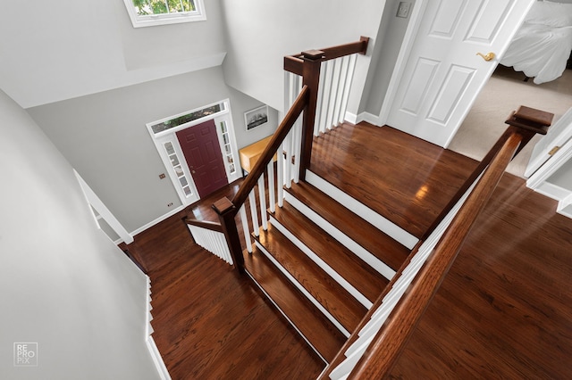 100 Homestead Dr, Wood Dale, IL 60191 - stairs with wood finished floors and a high ceiling