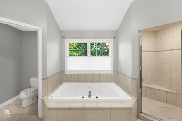 100 Homestead Dr, Wood Dale, IL 60191 - full bathroom featuring lofted ceiling, a tub with jets, a shower stall, and tile patterned floors