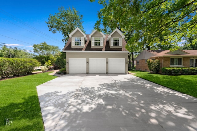100 Homestead Dr, Wood Dale, IL 60191 - traditional-style house with a front lawn, concrete driveway, and brick siding