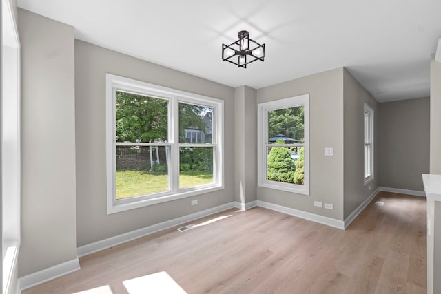 341 Tanager Dr, Woodstock, IL 60098 - unfurnished dining area with light wood-type flooring