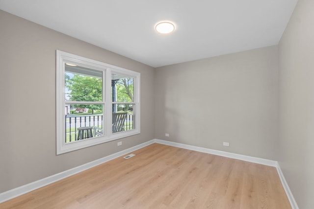 341 Tanager Dr, Woodstock, IL 60098 - empty room featuring light wood-style flooring and baseboards