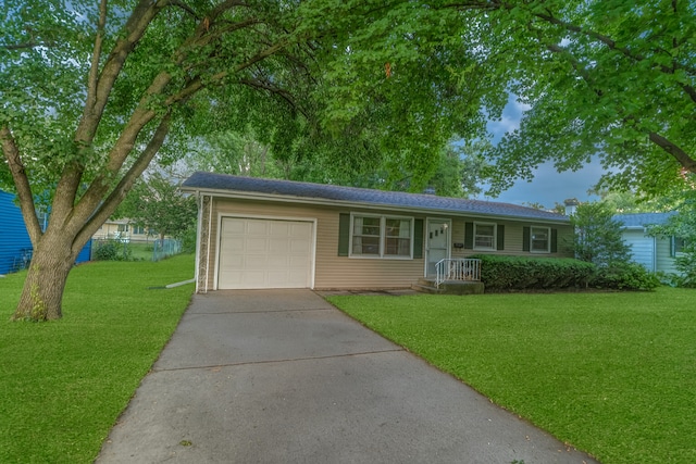 301 Virginia Dr, South Elgin, IL 60177 - ranch-style house featuring an attached garage, driveway, and a front lawn