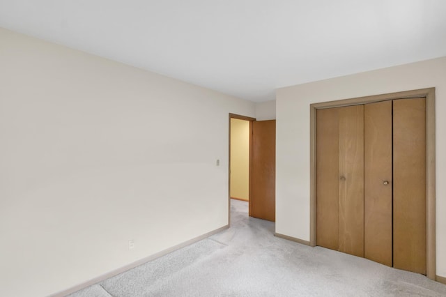 301 Virginia Dr, South Elgin, IL 60177 - unfurnished bedroom with light carpet and a closet