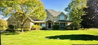 8747 Country Shire Ln, Spring Grove, IL 60081 - view of front of home with a front yard