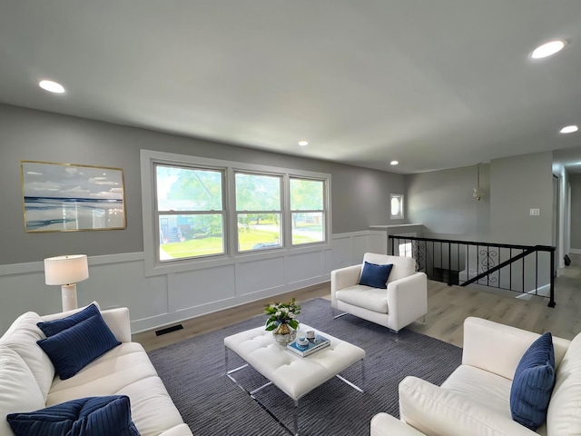 1813 218th Pl, Sauk Village, IL 60411 - living room with wood finished floors, recessed lighting, and wainscoting