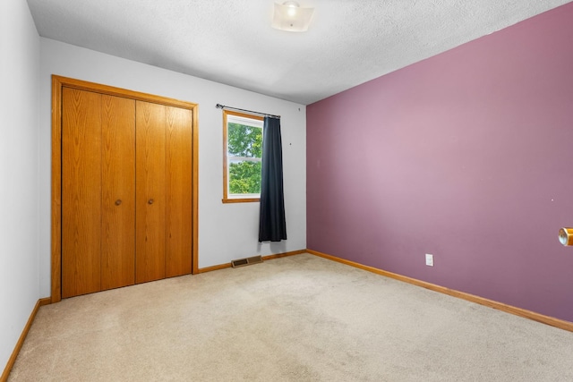 963 S Trainer Rd, Rockford, IL 61108 - unfurnished bedroom with carpet flooring and a closet