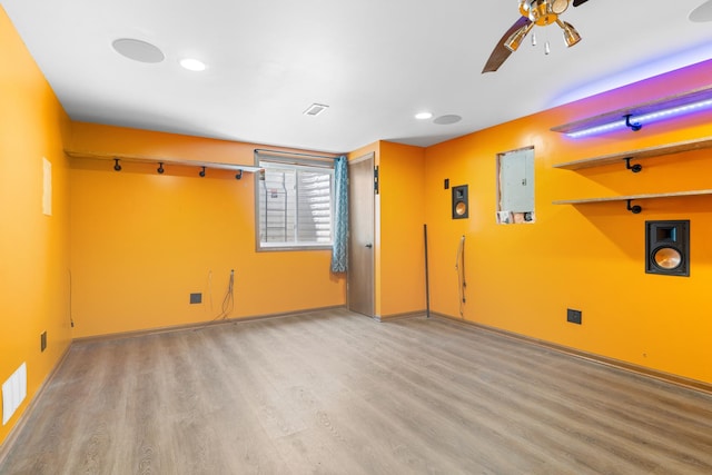 963 S Trainer Rd, Rockford, IL 61108 - unfurnished room featuring wood finished floors, a ceiling fan, and recessed lighting