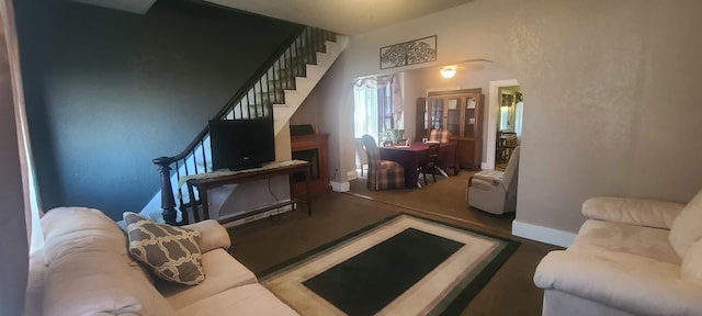109 S 6th Ave, Sterling, IL 61081 - living room featuring stairs and baseboards