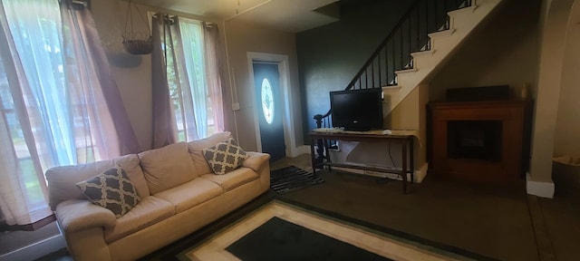 109 S 6th Ave, Sterling, IL 61081 - living area featuring plenty of natural light and stairway