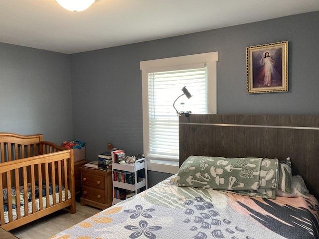 7814 S Trumbull Ave, Chicago, IL 60652 - bedroom featuring multiple windows and wood finished floors