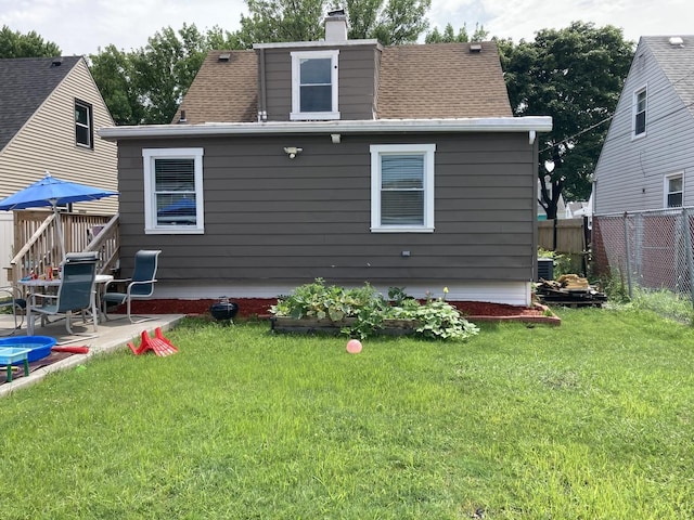 7814 S Trumbull Ave, Chicago, IL 60652 - back of house with a patio area, a chimney, and roof with shingles