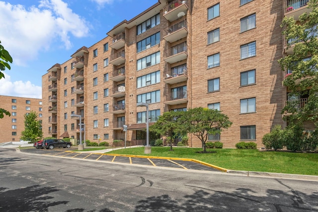 1777 W Crystal Ln Unit 711, Mount Prospect, IL 60056 - view of apartment building / complex with uncovered parking