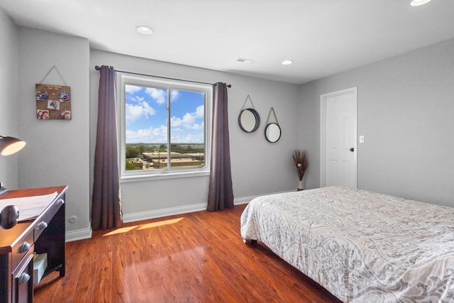 1777 W Crystal Ln Unit 711, Mount Prospect, IL 60056 - bedroom with wood finished floors and recessed lighting