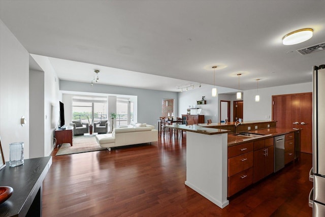 301 N Neil St Unit 609, Champaign, IL 61820 - kitchen featuring dishwasher, dark wood finished floors, pendant lighting, and open floor plan