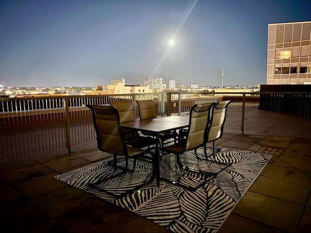 301 N Neil St Unit 609, Champaign, IL 61820 - view of patio / terrace with a city view and outdoor dining space