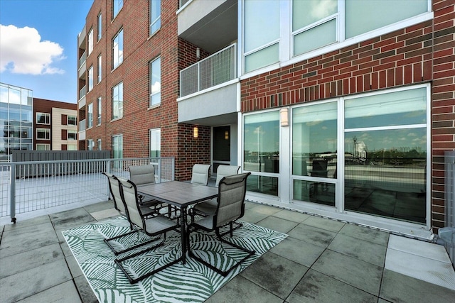 301 N Neil St Unit 609, Champaign, IL 61820 - view of patio / terrace featuring outdoor dining area
