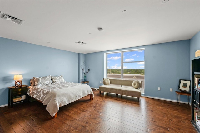 301 N Neil St Unit 609, Champaign, IL 61820 - bedroom with hardwood / wood-style floors and baseboards