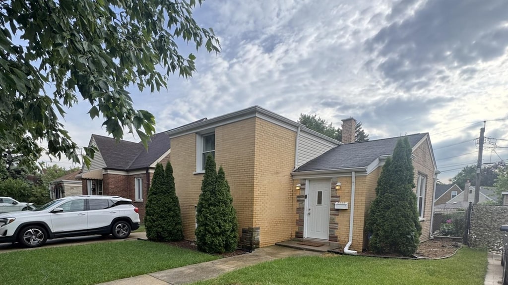 6444 S Lavergne Ave, Chicago, IL 60638 - view of front of home with brick siding and a chimney