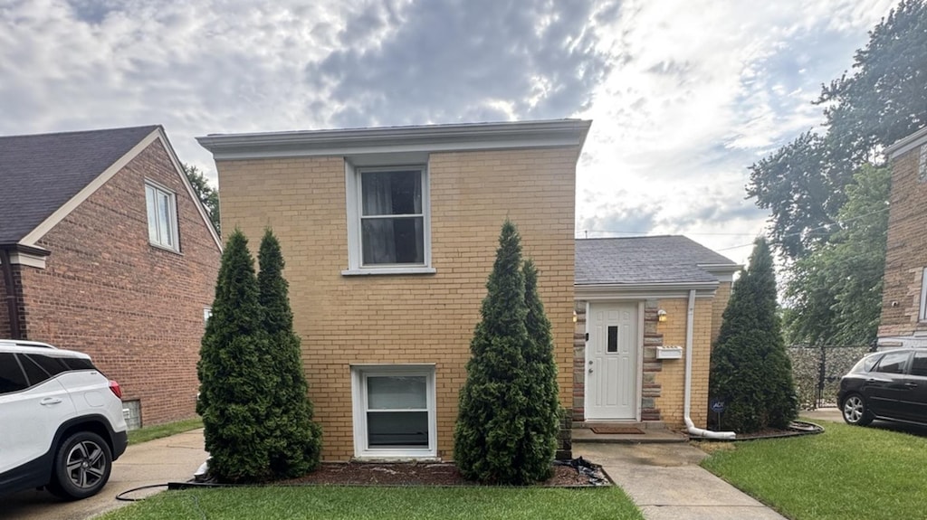 6444 S Lavergne Ave, Chicago, IL 60638 - view of front of house with brick siding and a front lawn