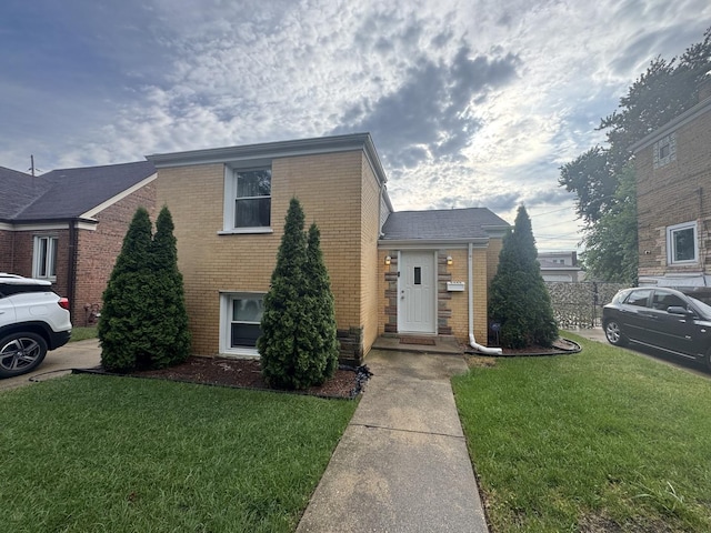 6444 S Lavergne Ave, Chicago, IL 60638 - view of front facade with brick siding and a front lawn