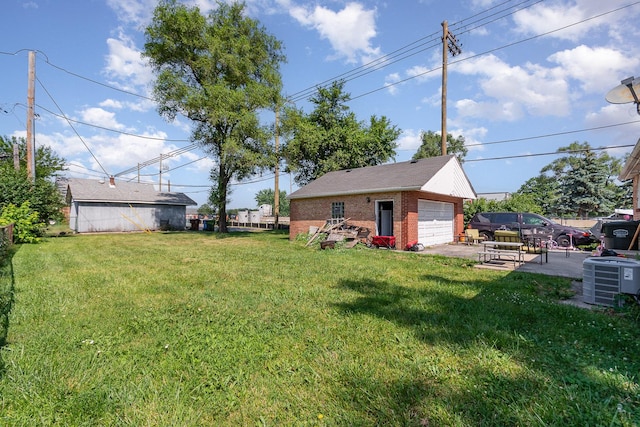 7900 S 86th Ct, Justice, IL 60458 - view of grassy yard featuring a garage