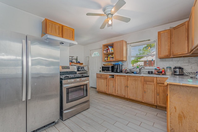 7900 S 86th Ct, Justice, IL 60458 - kitchen with stainless steel appliances, open shelves, under cabinet range hood, light countertops, and decorative backsplash