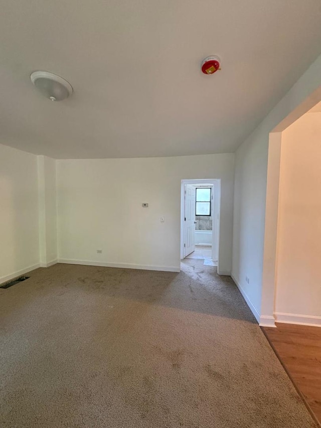 14040 Lincoln Ave, Dolton, IL 60419 - empty room featuring carpet flooring and baseboards