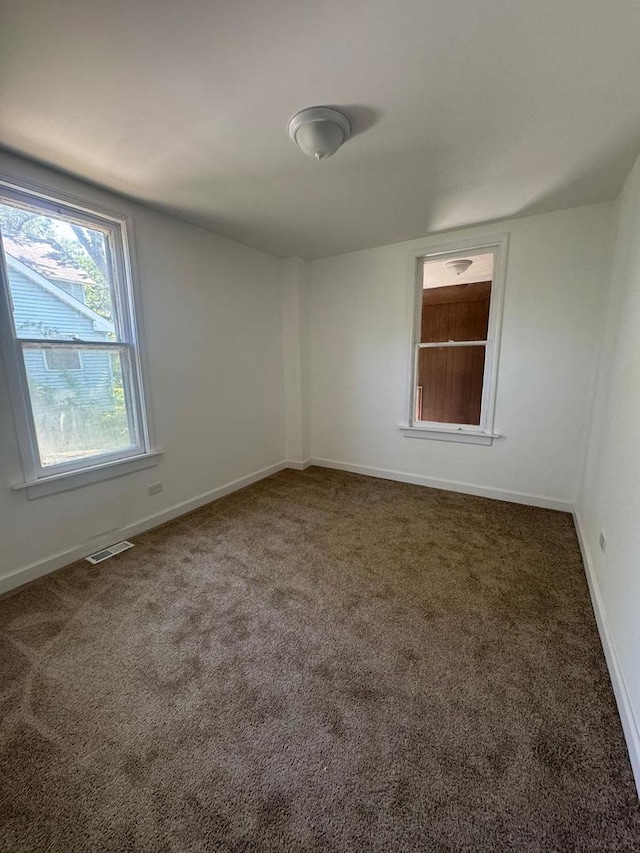 14040 Lincoln Ave, Dolton, IL 60419 - carpeted empty room with baseboards