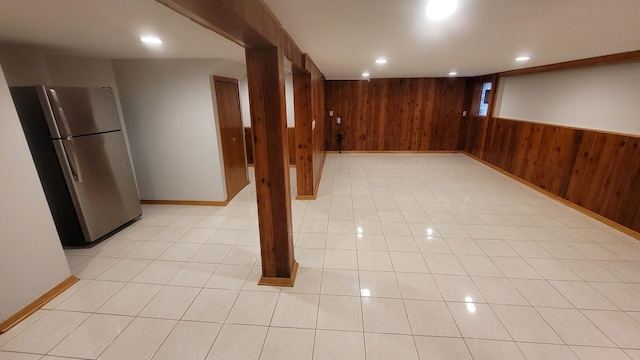 5448 W Agatite Ave, Chicago, IL 60630 - finished below grade area featuring freestanding refrigerator, wood walls, recessed lighting, and light tile patterned floors