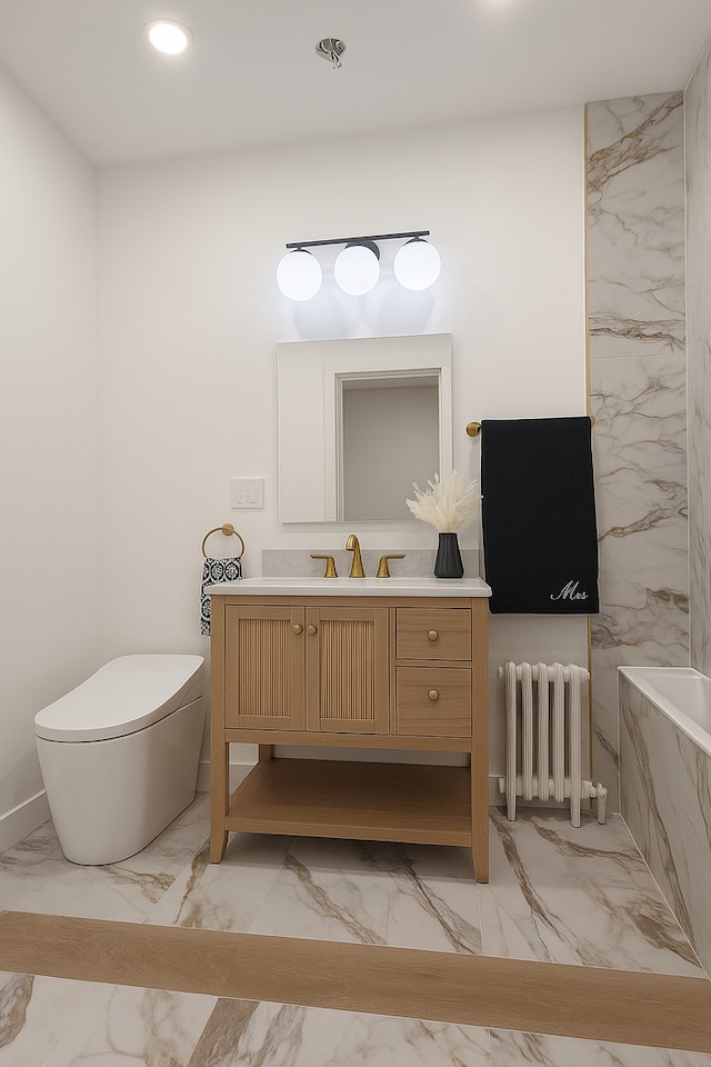 230 N Oak Park Ave Unit 1K, Oak Park, IL 60302 - full bath featuring radiator heating unit, marble tiled flooring, vanity, a tub with marble appearance, and recessed lighting