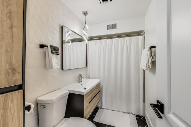 1333 W Touhy Ave Unit 102, Park Ridge, IL 60068 - bathroom featuring vanity, tile patterned flooring, and a shower with curtain