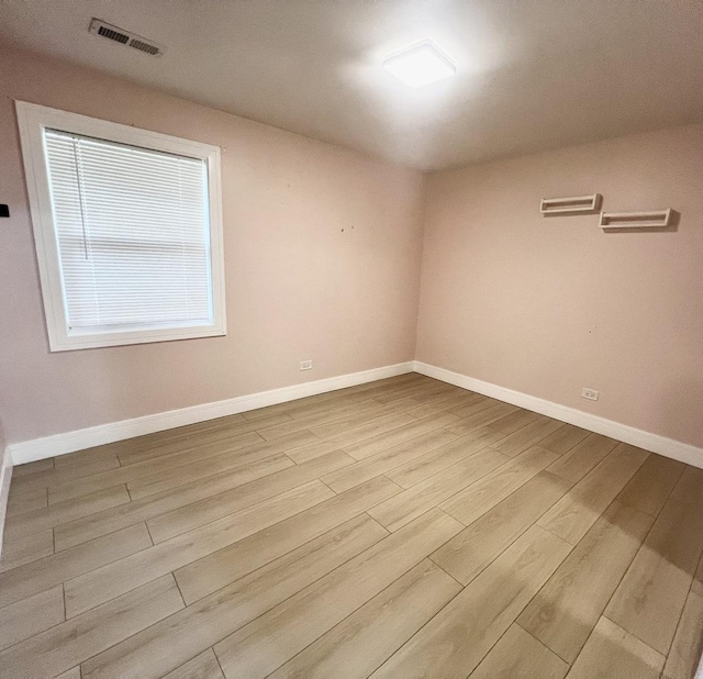 225 Webster Ln, Schaumburg, IL 60193 - unfurnished room featuring wood finished floors and baseboards