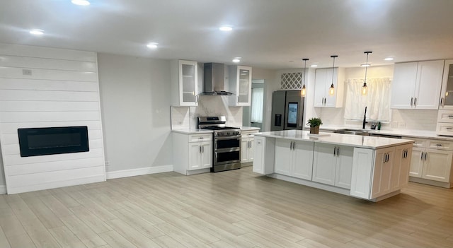 225 Webster Ln, Schaumburg, IL 60193 - kitchen with double oven range, wall chimney exhaust hood, refrigerator with ice dispenser, tasteful backsplash, and recessed lighting