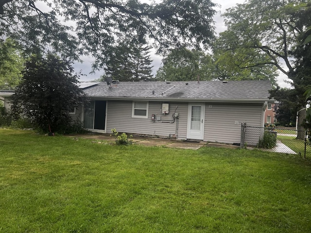 225 Webster Ln, Schaumburg, IL 60193 - rear view of house with a shingled roof and a garage