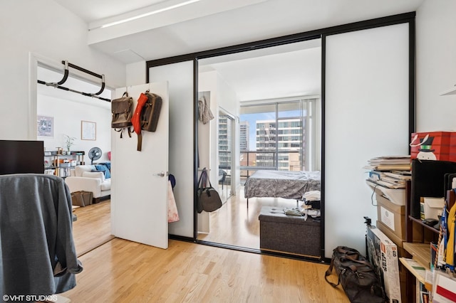 100 E 14th St Unit 1108, Chicago, IL 60605 - office area with wood finished floors and a wall of windows