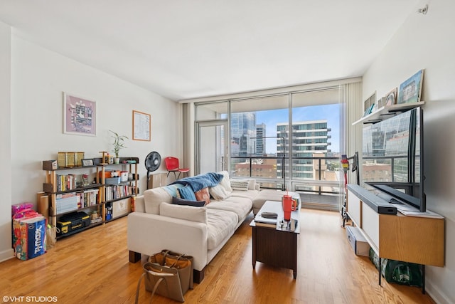 100 E 14th St Unit 1108, Chicago, IL 60605 - living room with wood finished floors and expansive windows