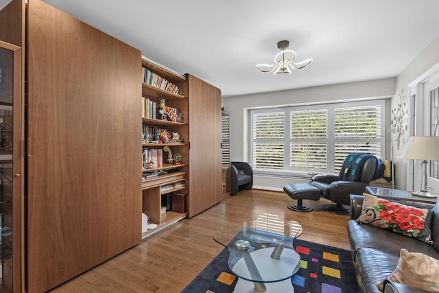 4049 Michelline Ln, Northbrook, IL 60062 - living room featuring wood finished floors and a chandelier