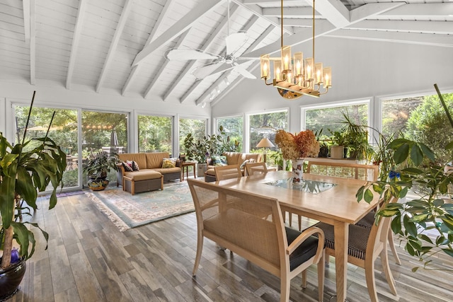 4049 Michelline Ln, Northbrook, IL 60062 - sunroom / solarium with high vaulted ceiling, wood finished floors, beam ceiling, a chandelier, and a deck