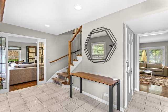 4049 Michelline Ln, Northbrook, IL 60062 - foyer entrance featuring stairway, light tile patterned flooring, french doors, and recessed lighting