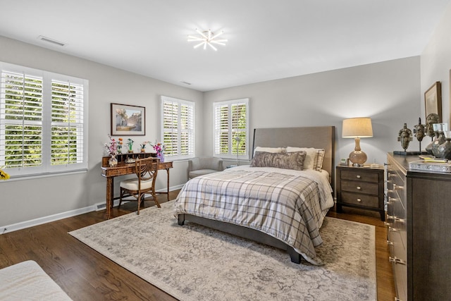 4049 Michelline Ln, Northbrook, IL 60062 - bedroom with dark wood finished floors and baseboards