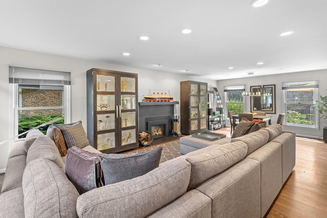 4049 Michelline Ln, Northbrook, IL 60062 - living room with a fireplace with flush hearth, recessed lighting, and wood finished floors