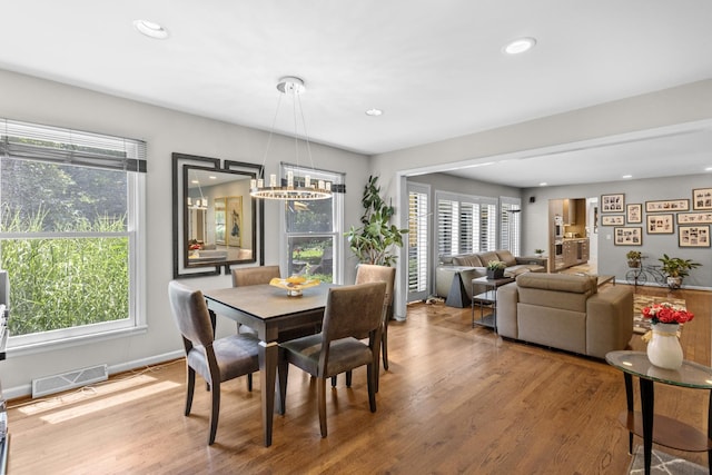 4049 Michelline Ln, Northbrook, IL 60062 - dining space with healthy amount of natural light, wood finished floors, and recessed lighting