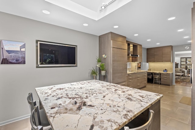 4049 Michelline Ln, Northbrook, IL 60062 - kitchen with recessed lighting, wall chimney range hood, modern cabinets, light stone countertops, and brown cabinets
