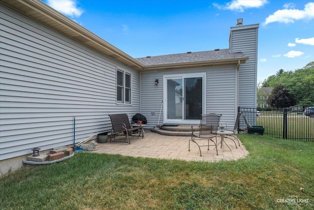 906 Whitetail Ln, Sandwich, IL 60548 - rear view of property with a chimney and a patio