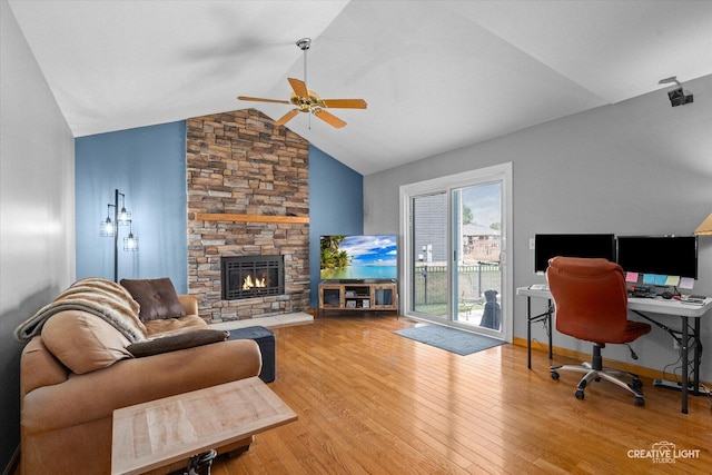906 Whitetail Ln, Sandwich, IL 60548 - living room featuring a ceiling fan, wood finished floors, lofted ceiling, a fireplace, and a desk