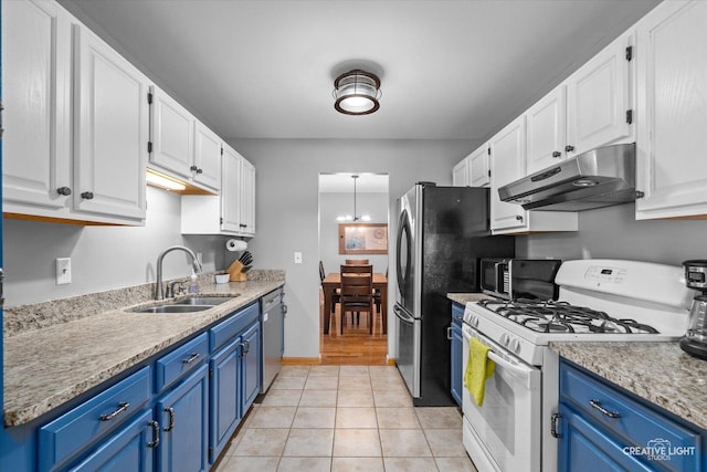 906 Whitetail Ln, Sandwich, IL 60548 - kitchen featuring appliances with stainless steel finishes, under cabinet range hood, blue cabinetry, and white cabinetry