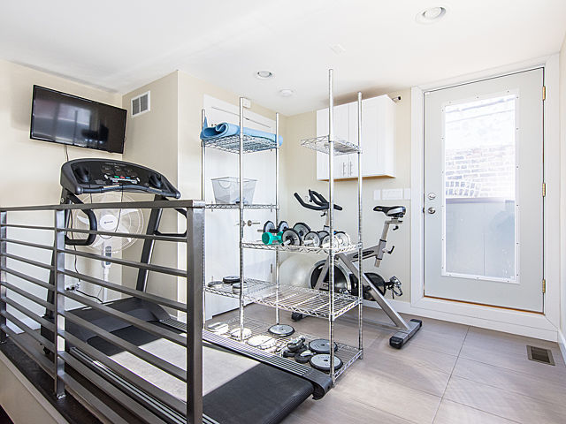 2036 W Huron St, Chicago, IL 60612 - exercise room with tile patterned flooring and recessed lighting