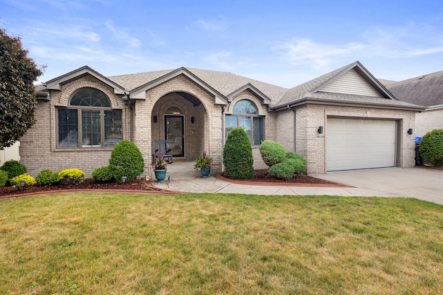 18049 Brittany Ln, Lansing, IL 60438 - view of front of home with driveway, brick siding, a garage, and a shingled roof